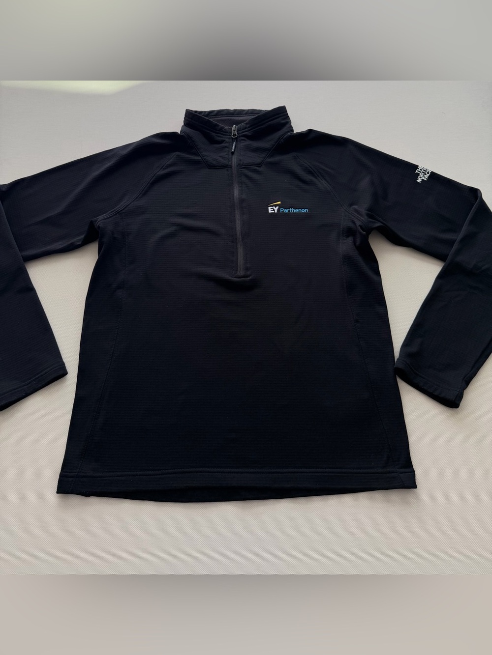 The North Face Men’s Black Quarter-Zip Rash Guard with EY Parthenon Logo